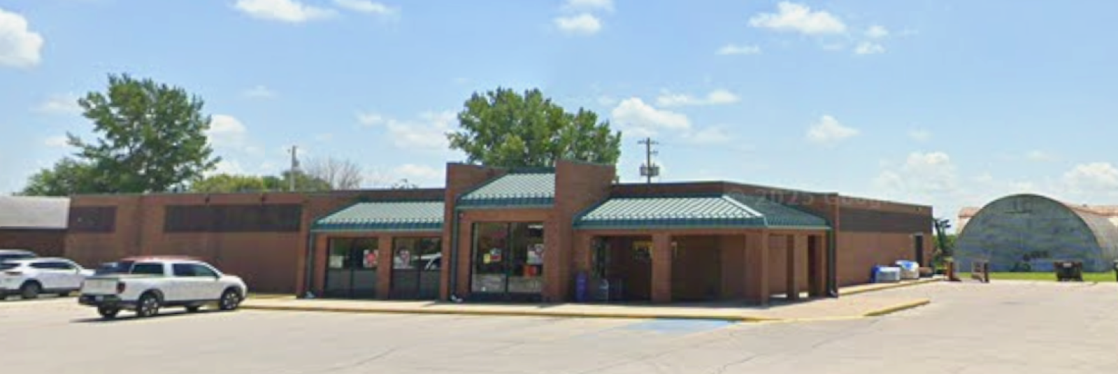 An exterior shot of the grocery store.