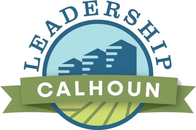 The Leadership Calhoun logo, which is a graphic of blue buildings set on a green farm field.